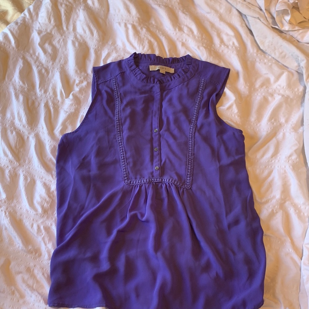 Sleeveless purple blouse